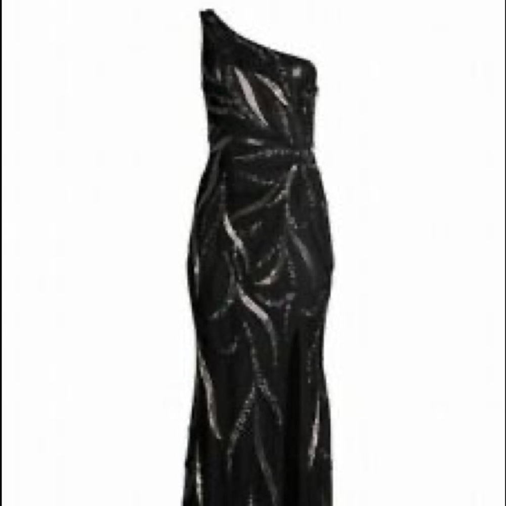 Gorgeous one shoulder sequin gown perfect for a wedding or black tie event.